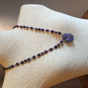 Artisan made purple necklace